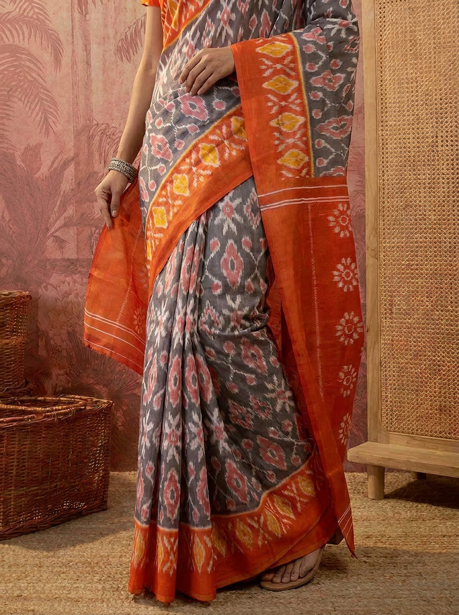 Pochampally Ikat Handloom Saree in Vibrant Orange and Blue.
