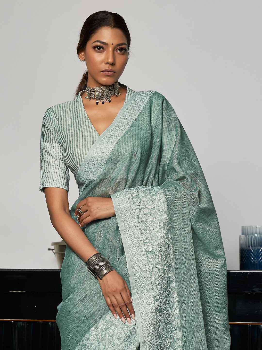 Enticing Weaving Work Rama Color Linen Cotton Saree