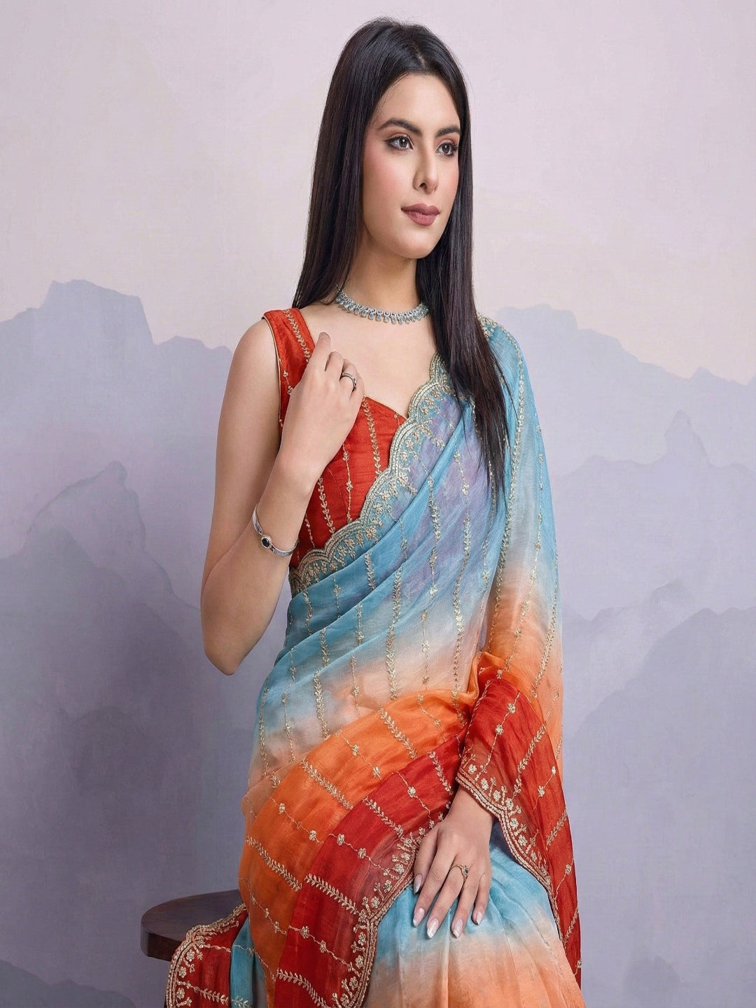 Embellished Embroidered Satin Heavy Work Saree.