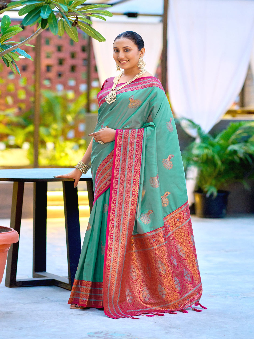 Elegant Peach Silk Saree with Contrast Maroon Heavy Zari Work