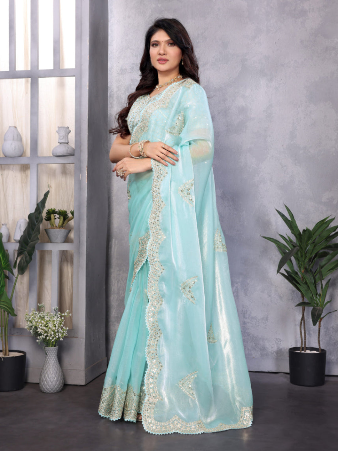 Fine Organza or Shimmer Chiffon suitable for formal ceremonial wear saree.