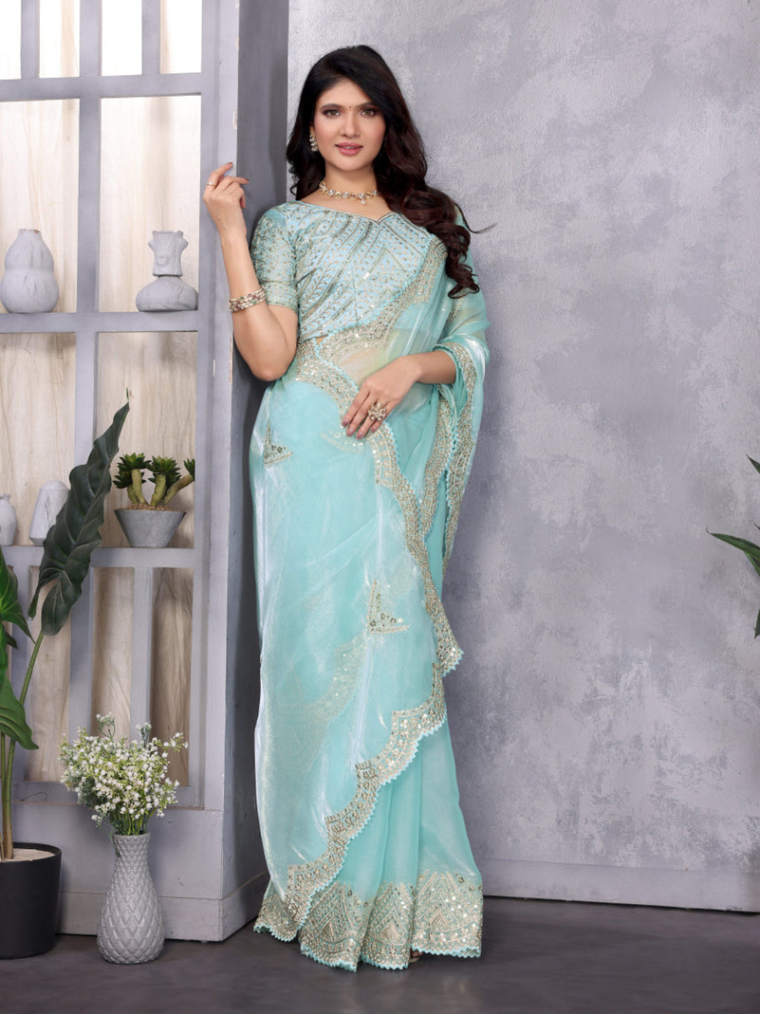 Fine Organza or Shimmer Chiffon suitable for formal ceremonial wear saree.
