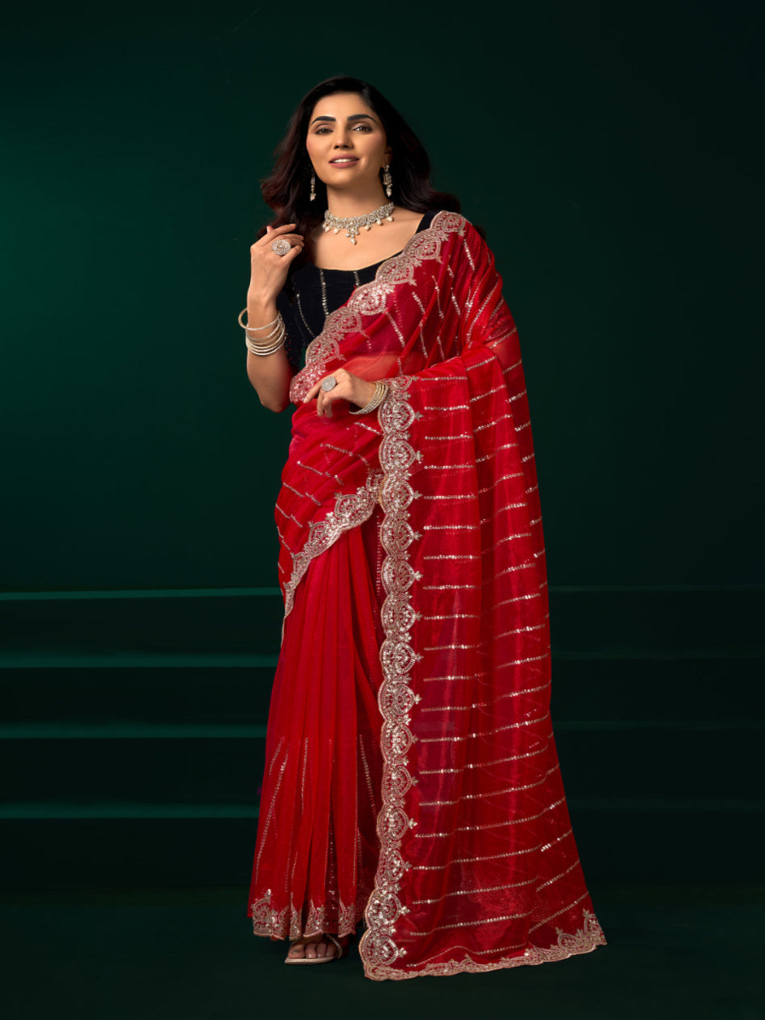 Modern Heritage: Red Net Saree with Black Embroiderd Blouse.