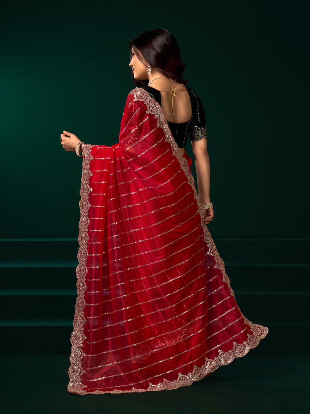 Modern Heritage: Red Net Saree with Black Embroiderd Blouse.