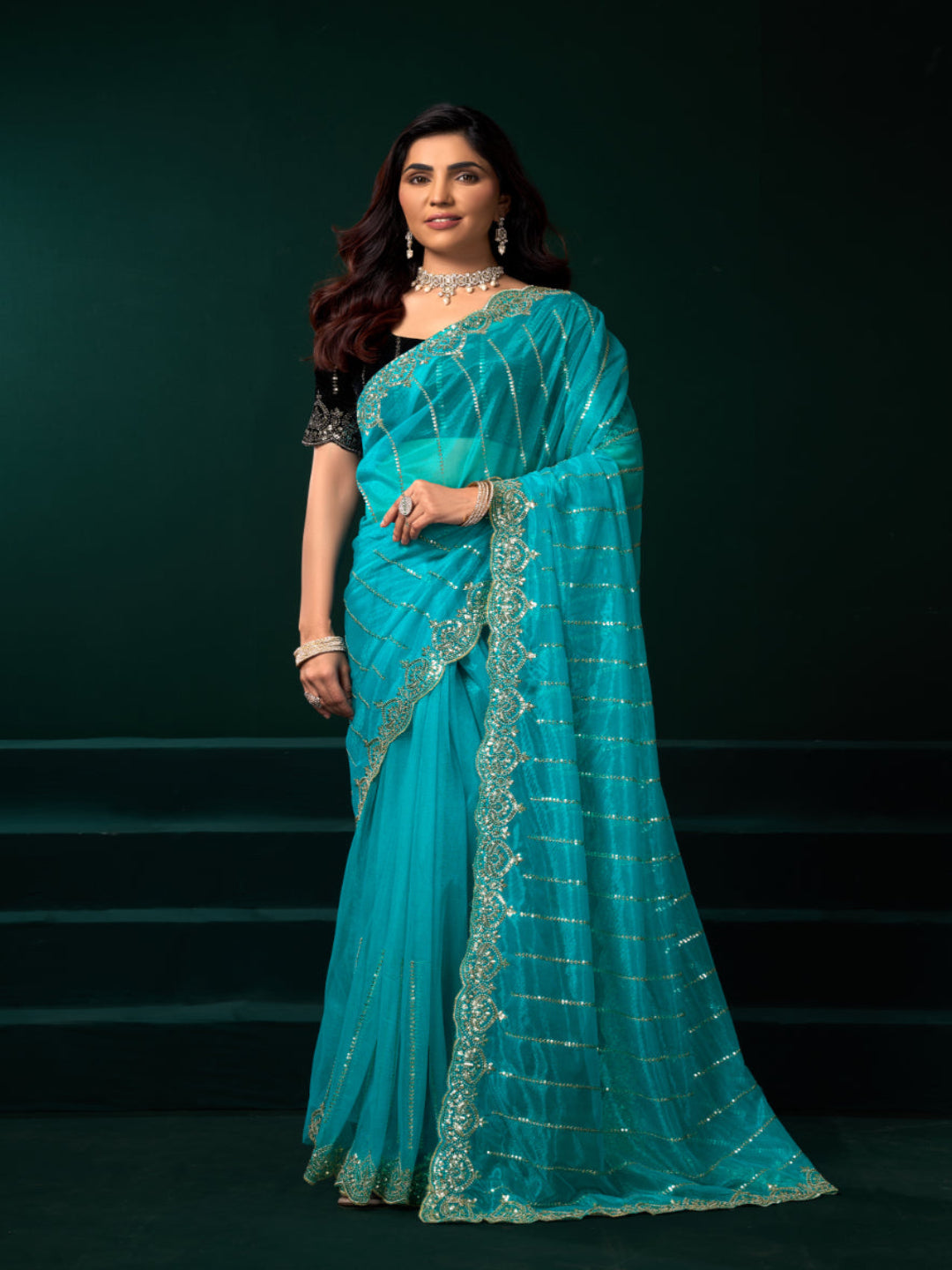 Modern Heritage: Red Net Saree with Black Embroiderd Blouse.