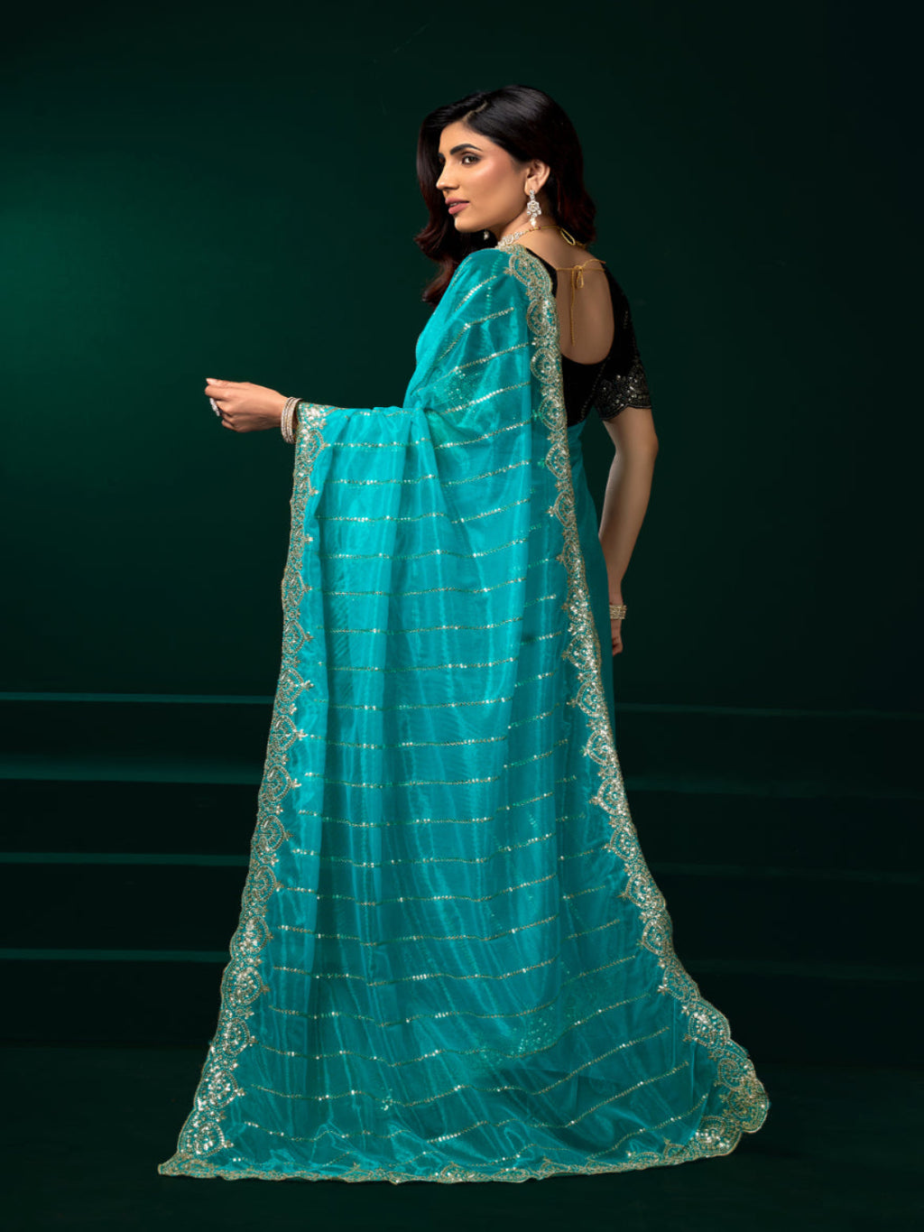 Modern Heritage: Red Net Saree with Black Embroiderd Blouse.