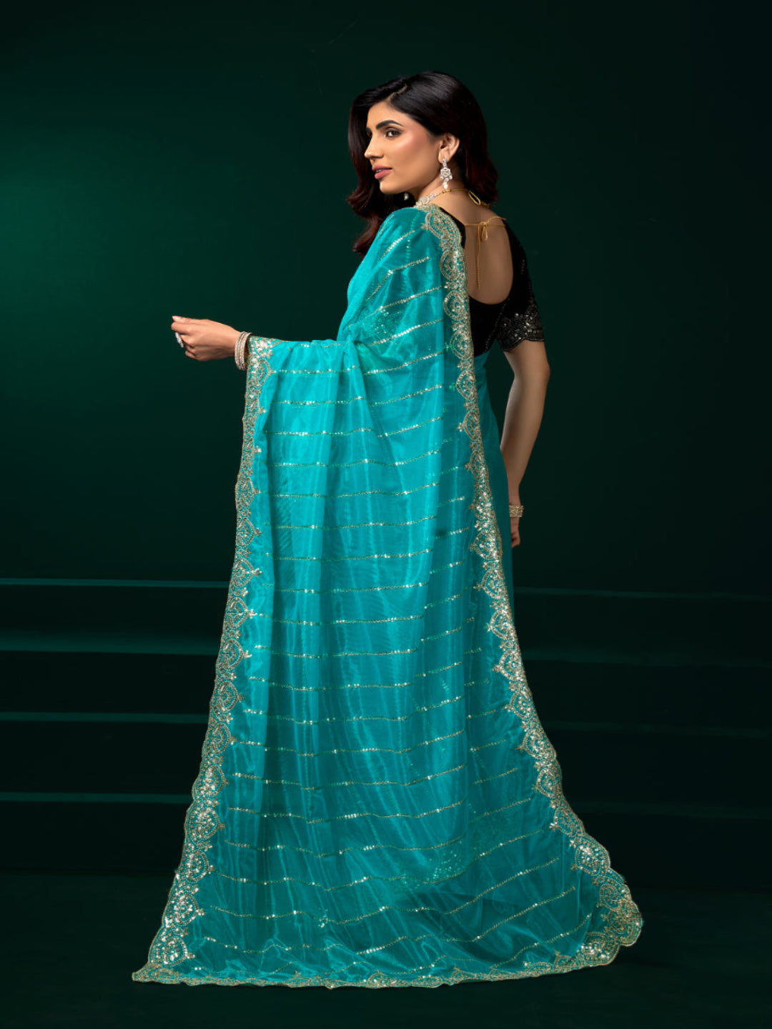 Modern Heritage: Red Net Saree with Black Embroiderd Blouse.