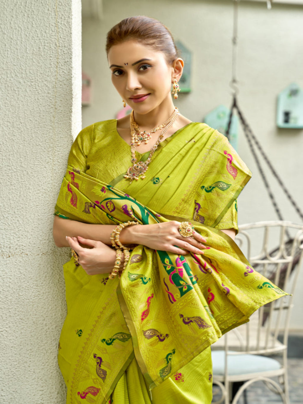 Lime Green Paithani Silk Saree features a standout  symbolizing prosperity and growth.