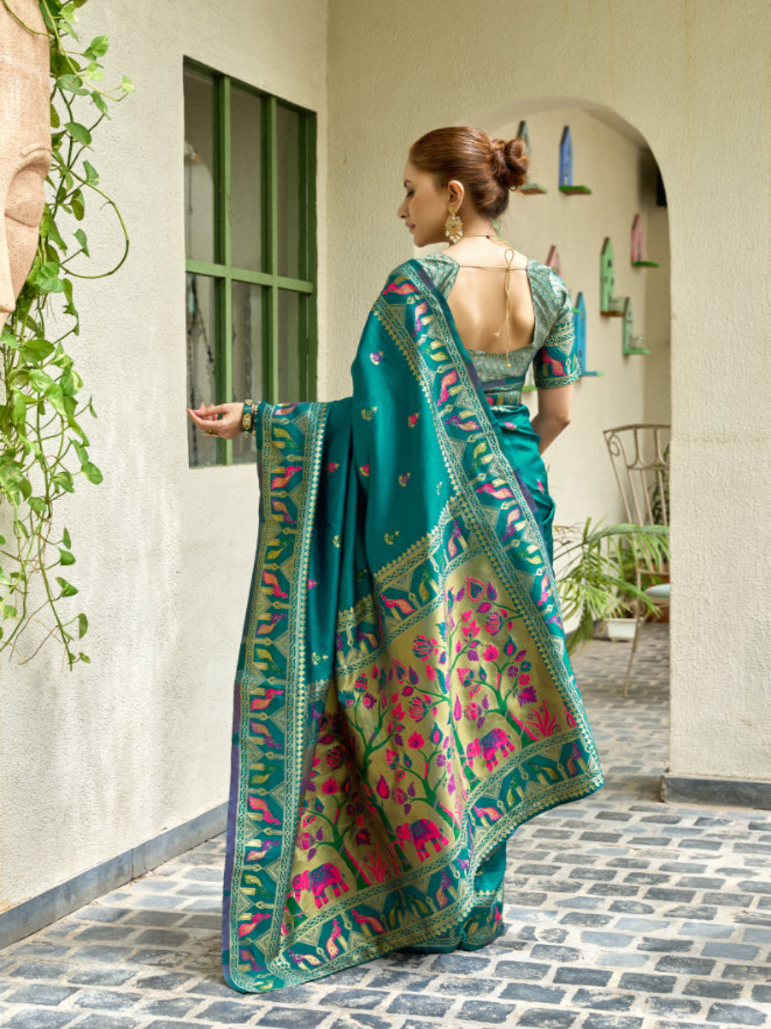 Lime Green Paithani Silk Saree features a standout  symbolizing prosperity and growth.
