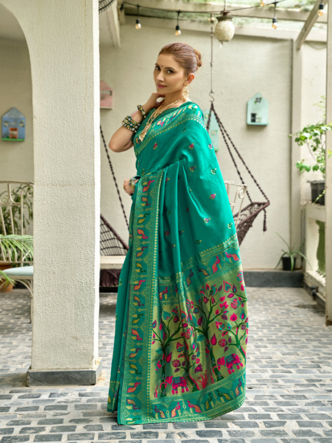 Lime Green Paithani Silk Saree features a standout  symbolizing prosperity and growth.