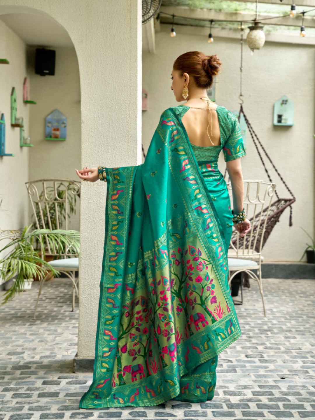 Lime Green Paithani Silk Saree features a standout  symbolizing prosperity and growth.