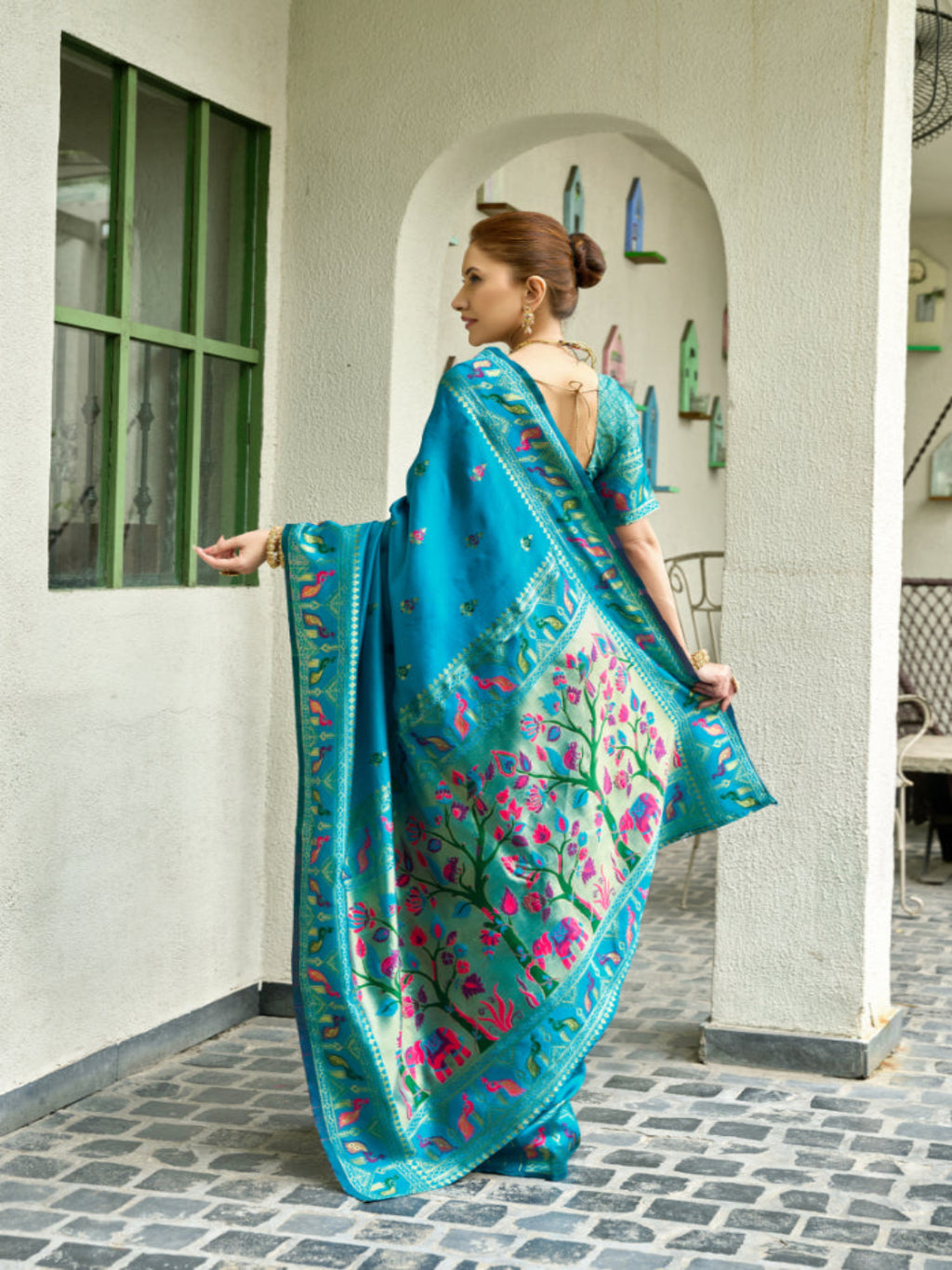 Lime Green Paithani Silk Saree features a standout  symbolizing prosperity and growth.