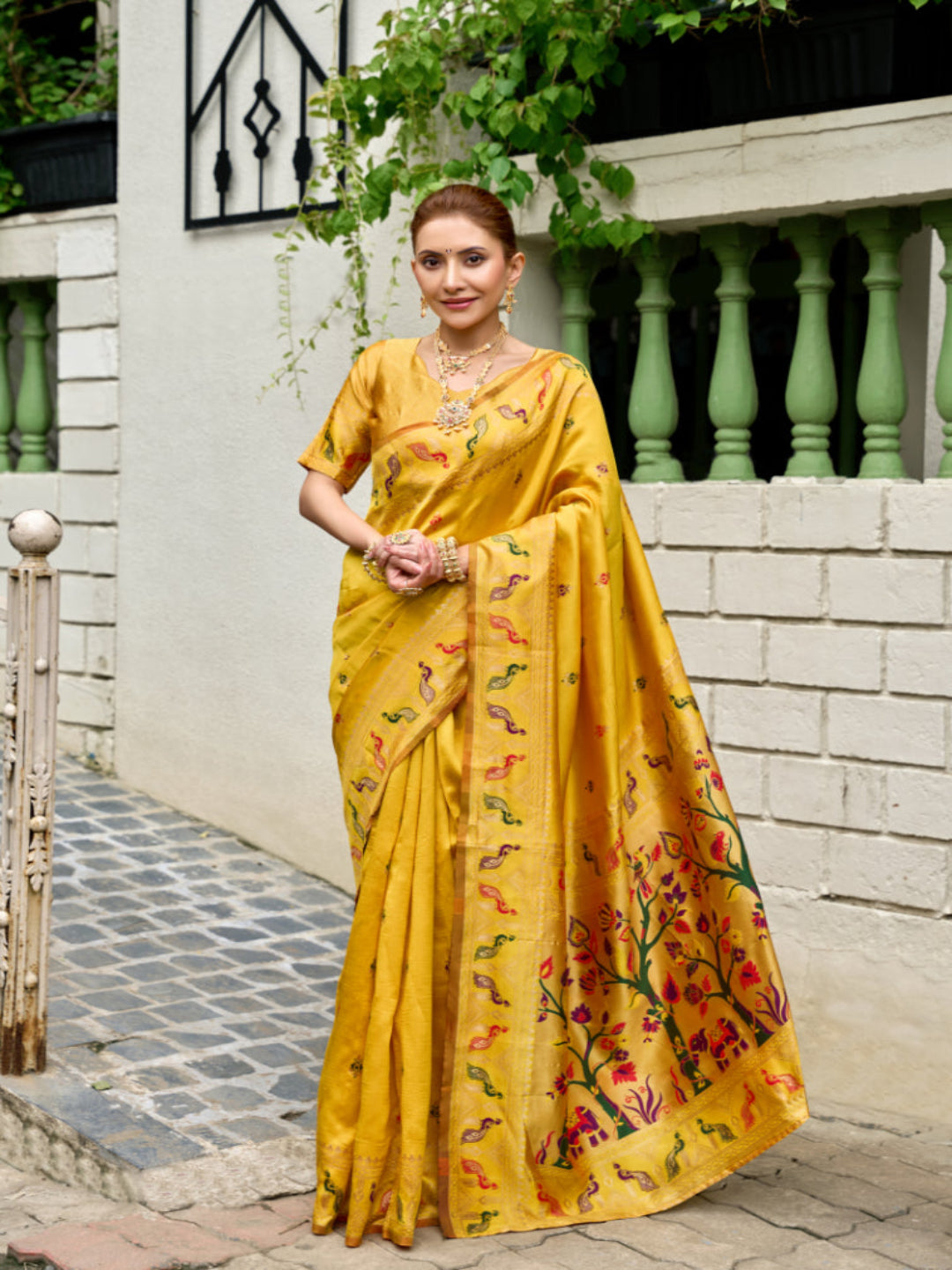 Lime Green Paithani Silk Saree features a standout  symbolizing prosperity and growth.