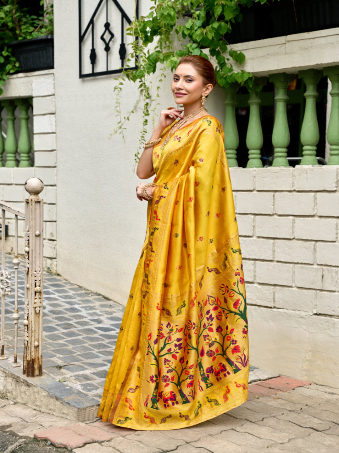 Lime Green Paithani Silk Saree features a standout  symbolizing prosperity and growth.