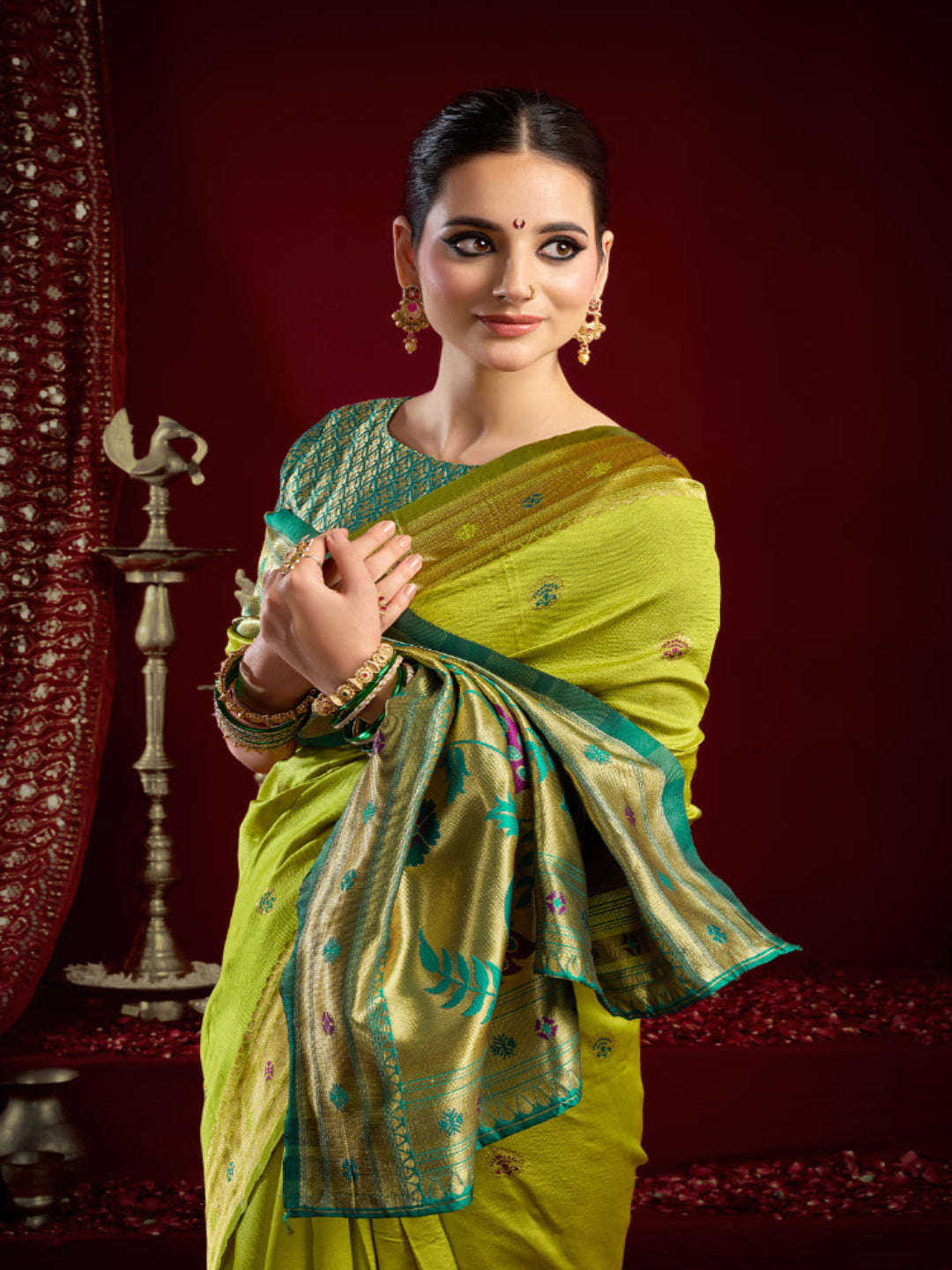 "The Golden Glow of Tradition silk bland butti weaving Paithani saree