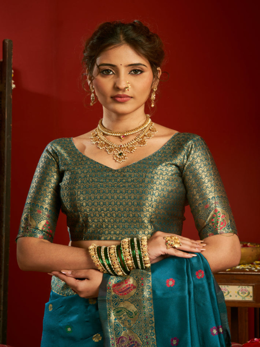 Majesty Designer Paithani: Captures the regal peacock and floral zari work.