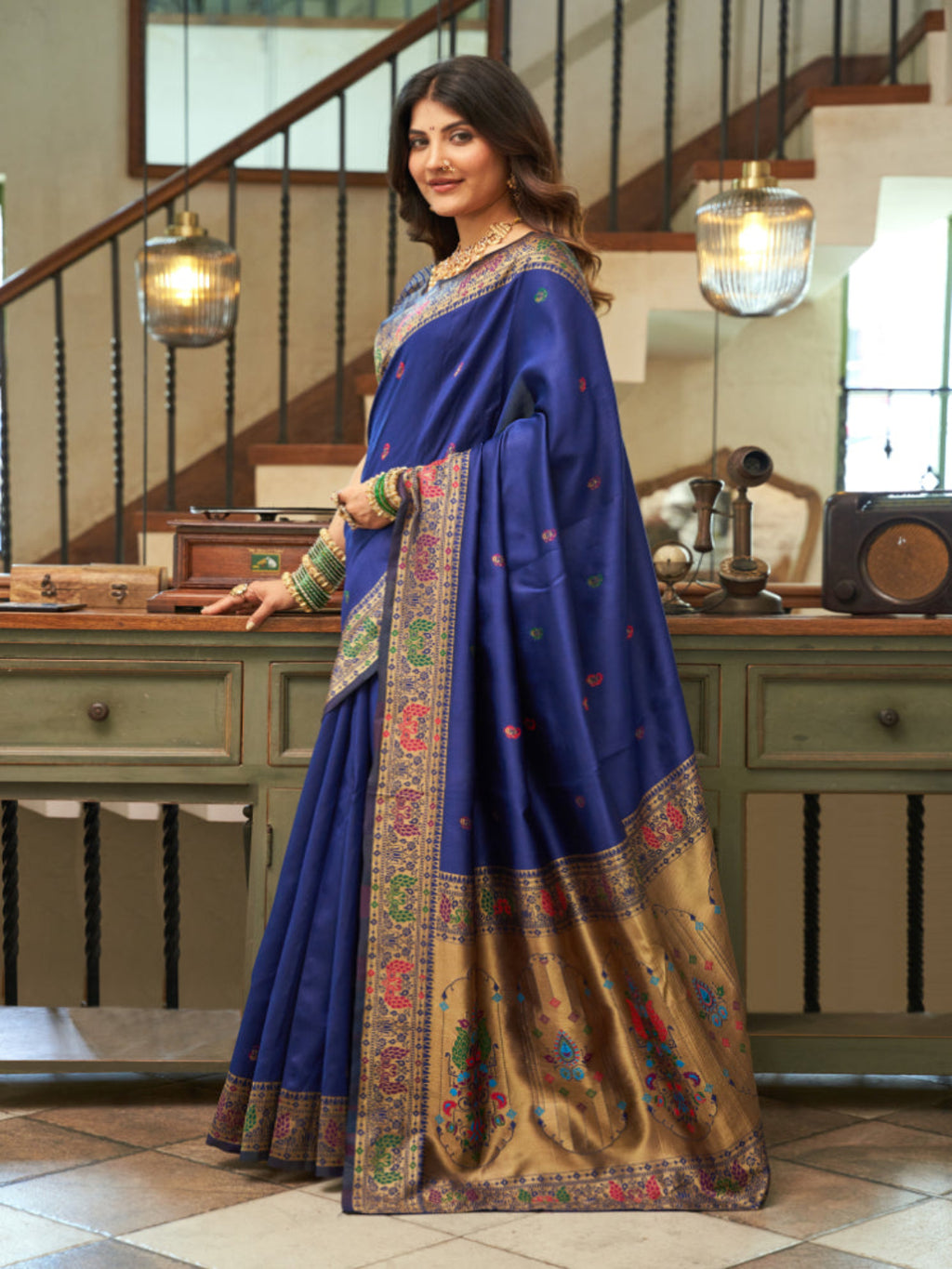Emerald Heritage: Captures the deep green hue and the traditional Paithani artistry.