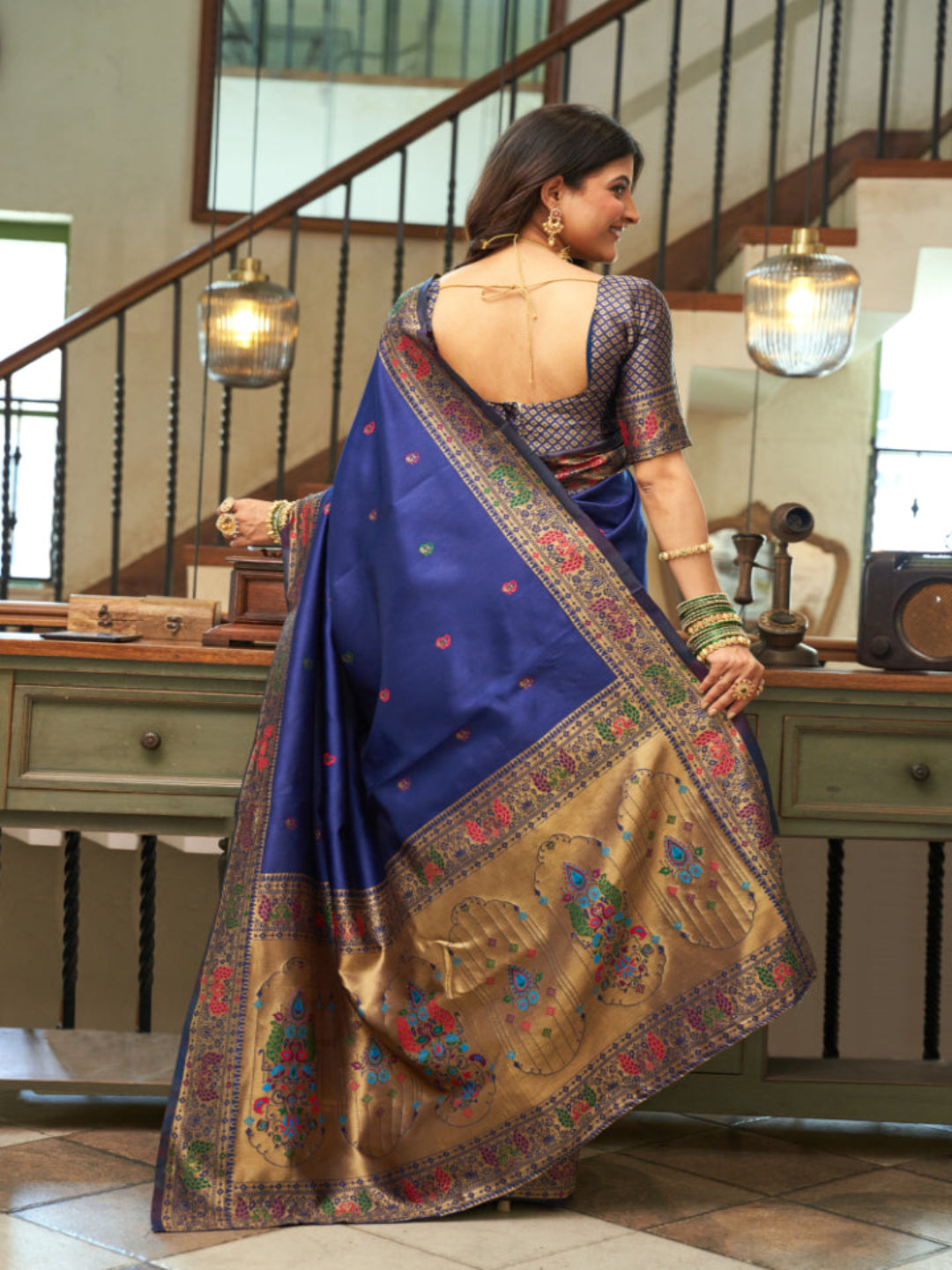 Emerald Heritage: Captures the deep green hue and the traditional Paithani artistry.