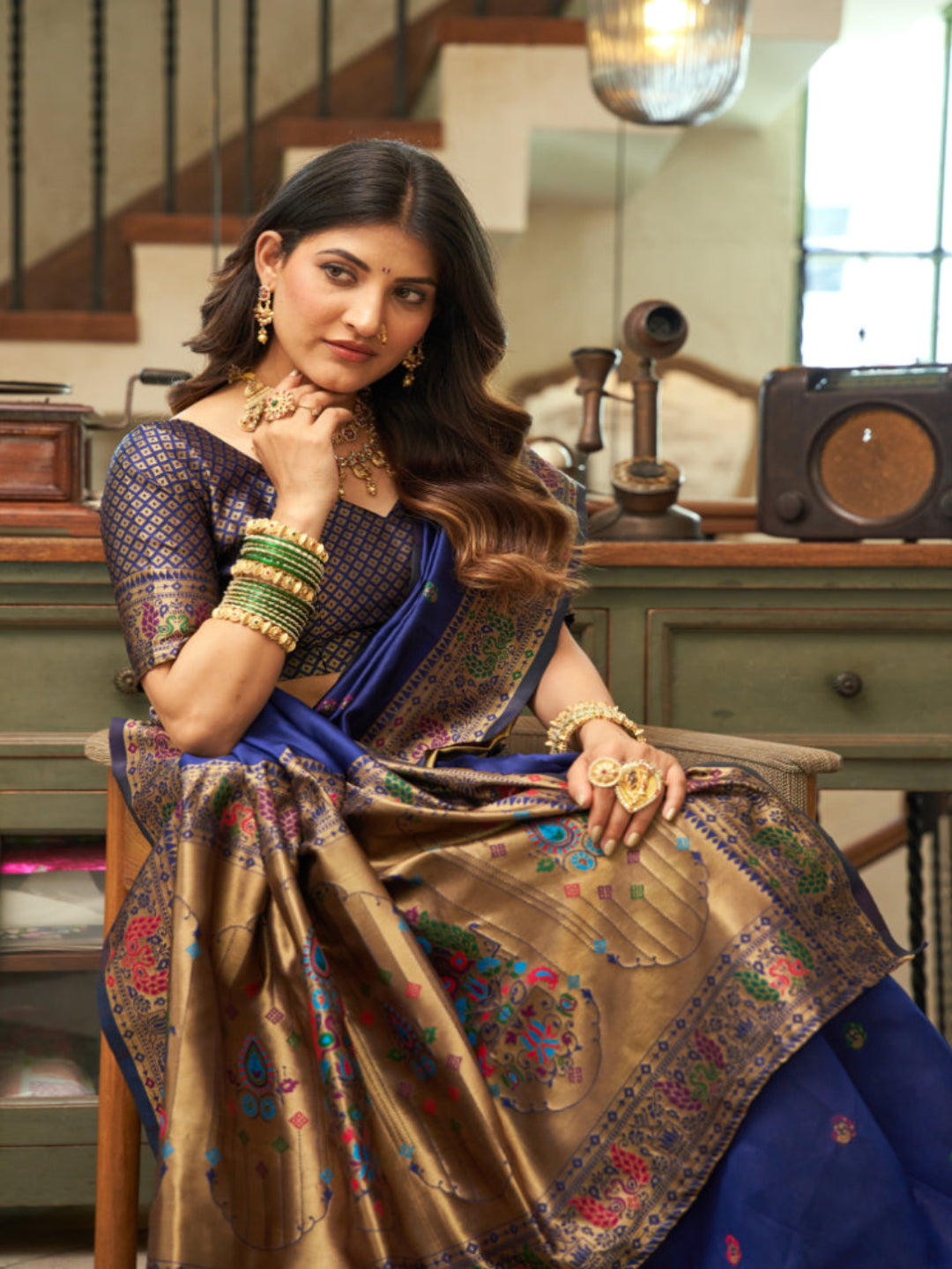 Majesty Designer Paithani: Captures the regal peacock and floral zari work.
