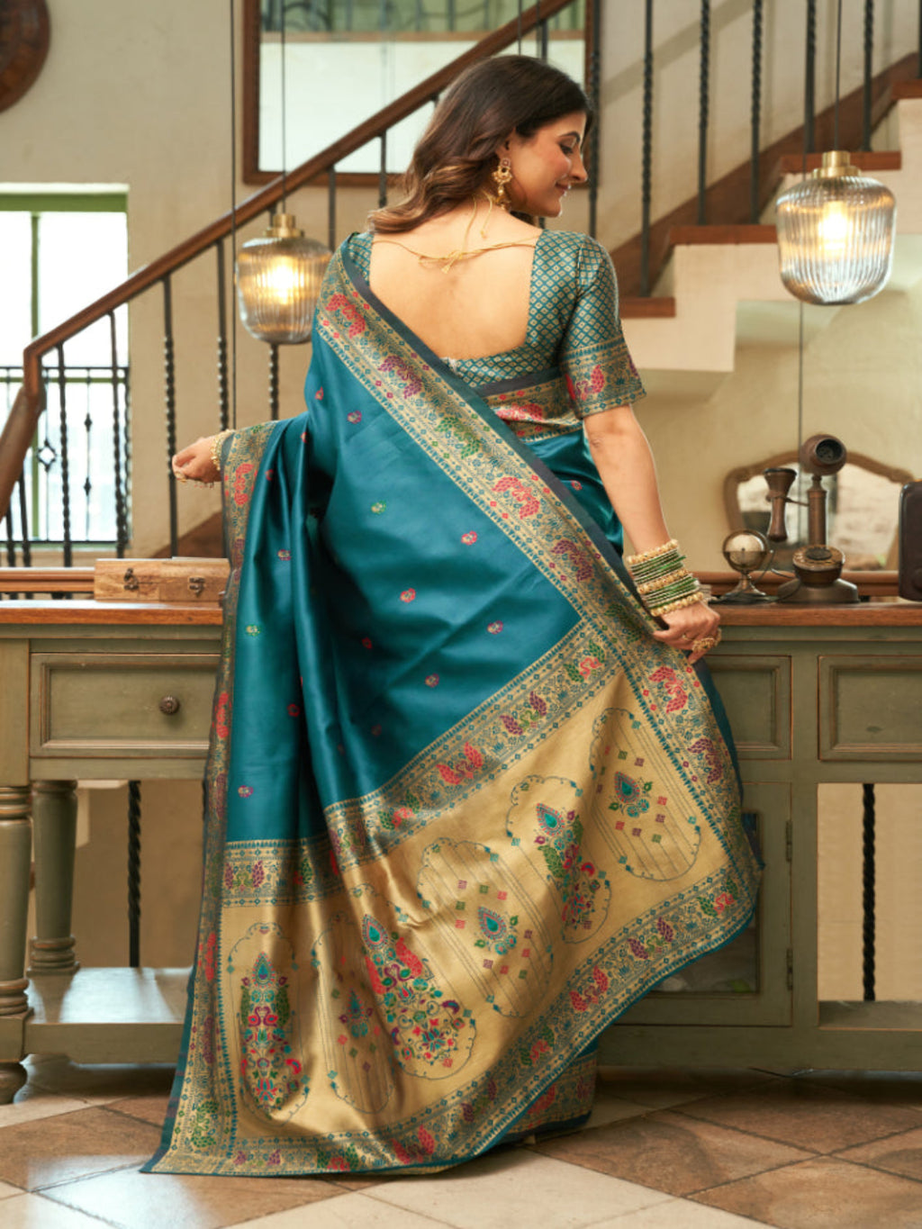 Emerald Heritage: Captures the deep green hue and the traditional Paithani artistry.