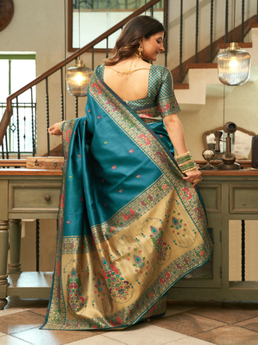 Emerald Heritage: Captures the deep green hue and the traditional Paithani artistry.