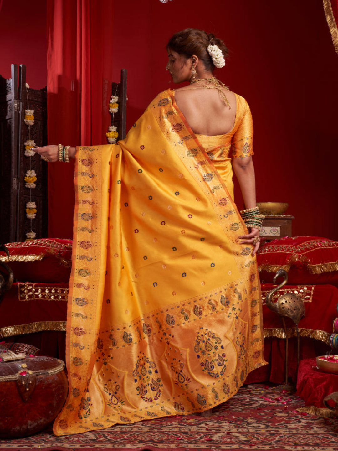 Emerald Heritage: Captures the deep green hue and the traditional Paithani artistry.