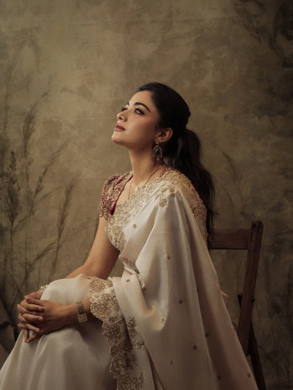 ivory saree crafted from silk with detailed gold Zardosi embroidery