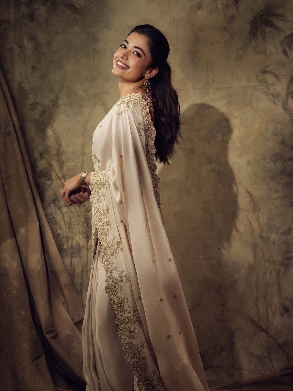 ivory saree crafted from silk with detailed gold Zardosi embroidery