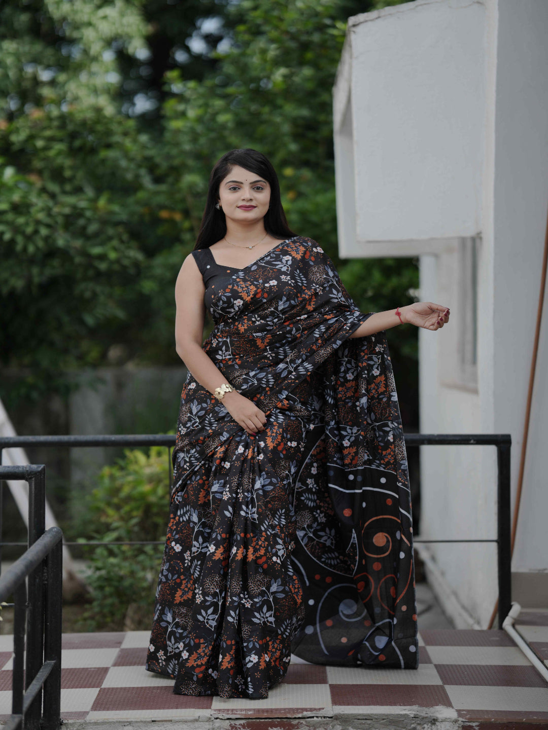 Black Floral Daily Wear Cotton Saree: Focuses on its suitability for everyday comfort and style.