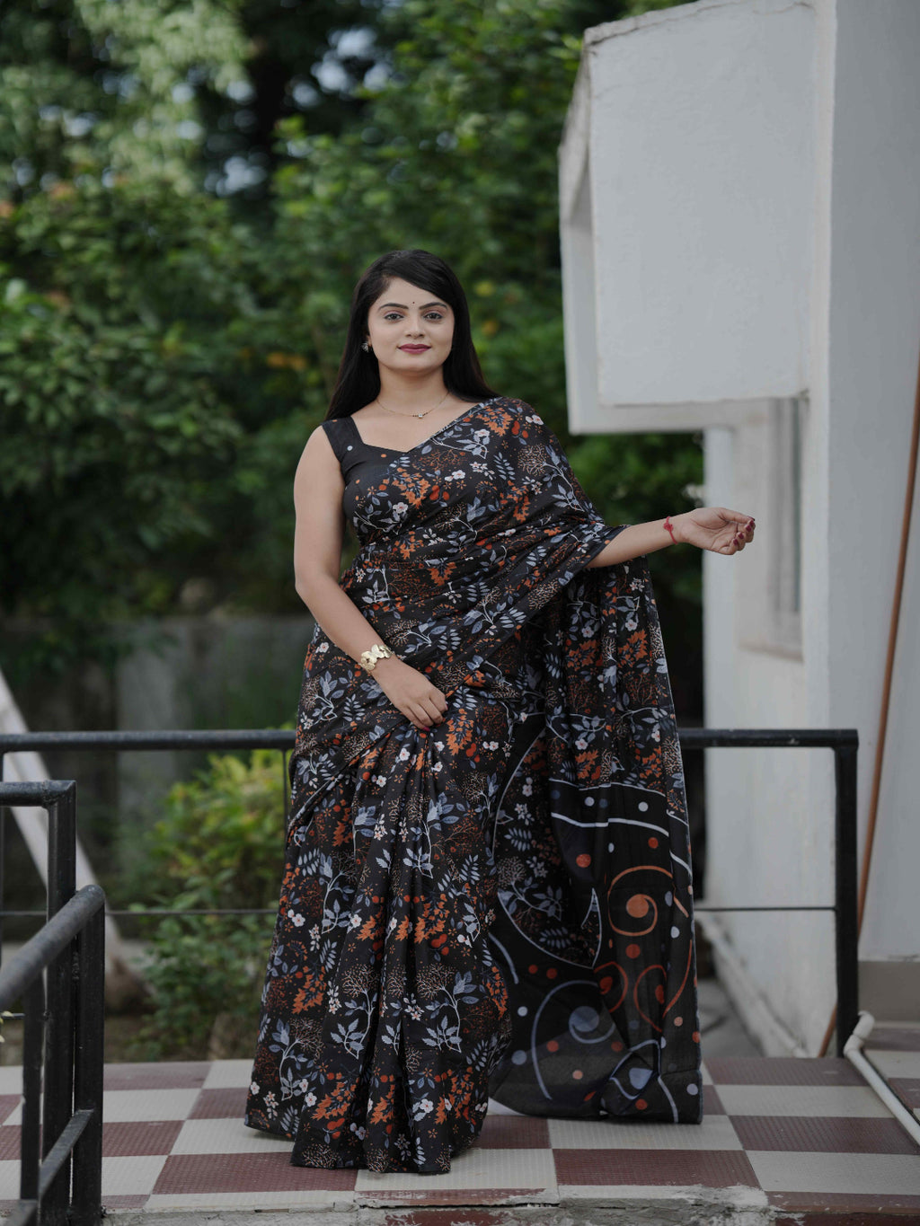 Black Floral Daily Wear Cotton Saree: Focuses on its suitability for everyday comfort and style.