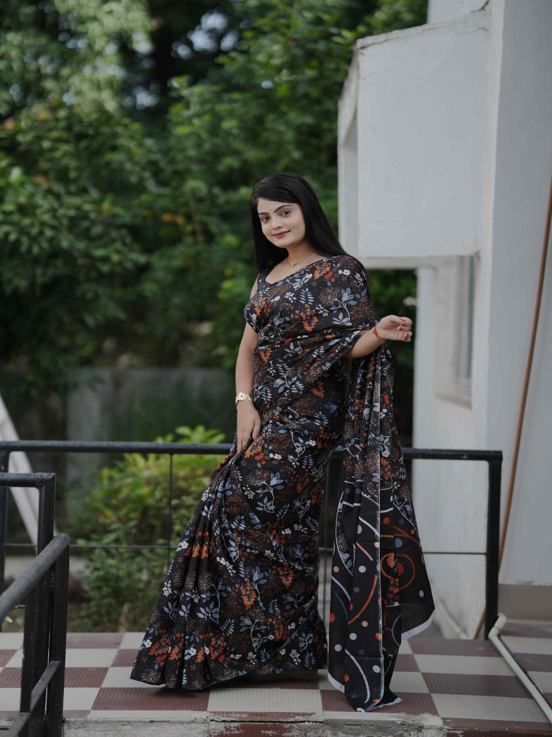 Black Floral Daily Wear Cotton Saree: Focuses on its suitability for everyday comfort and style.
