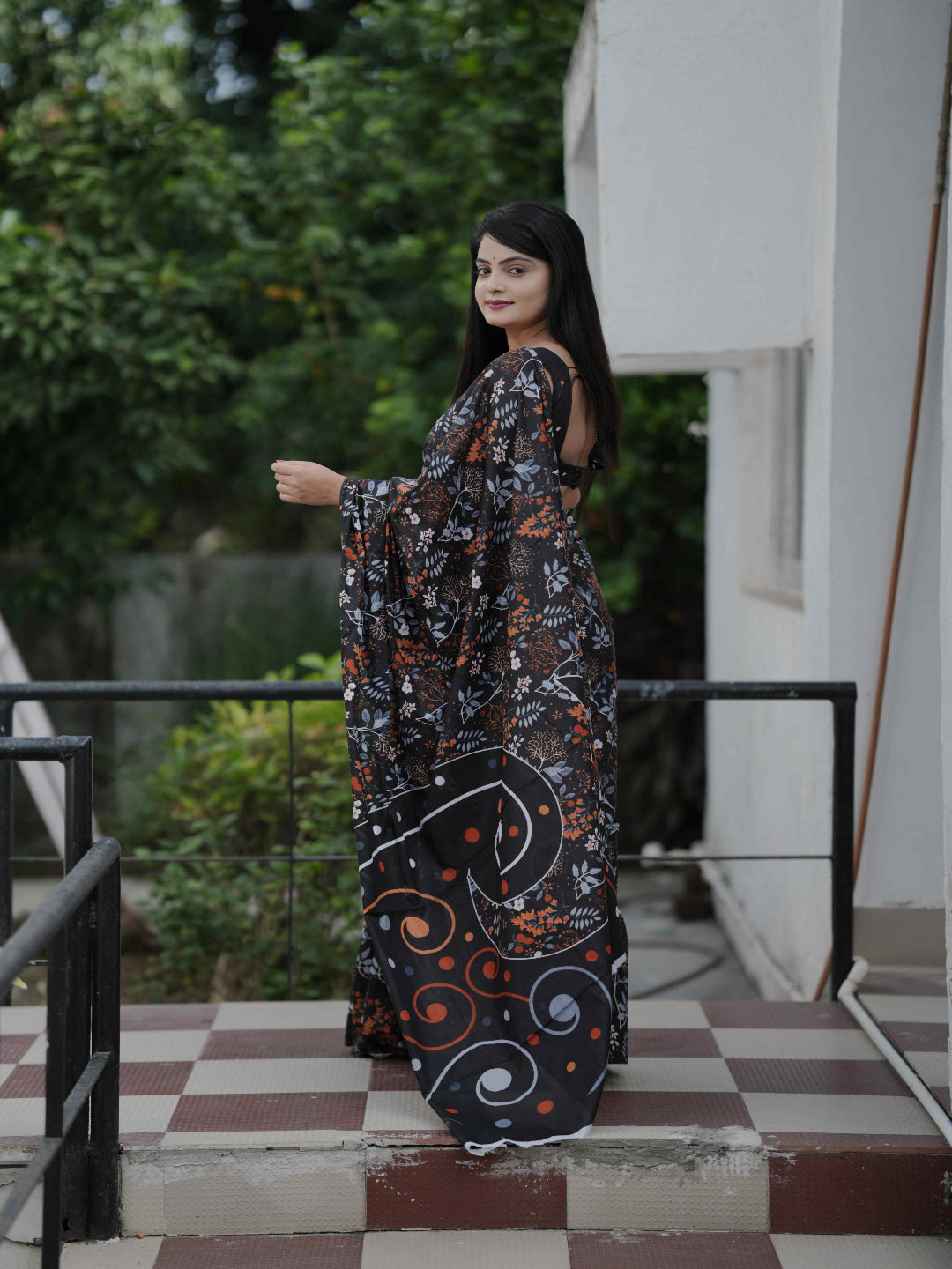 Black Floral Daily Wear Cotton Saree: Focuses on its suitability for everyday comfort and style.