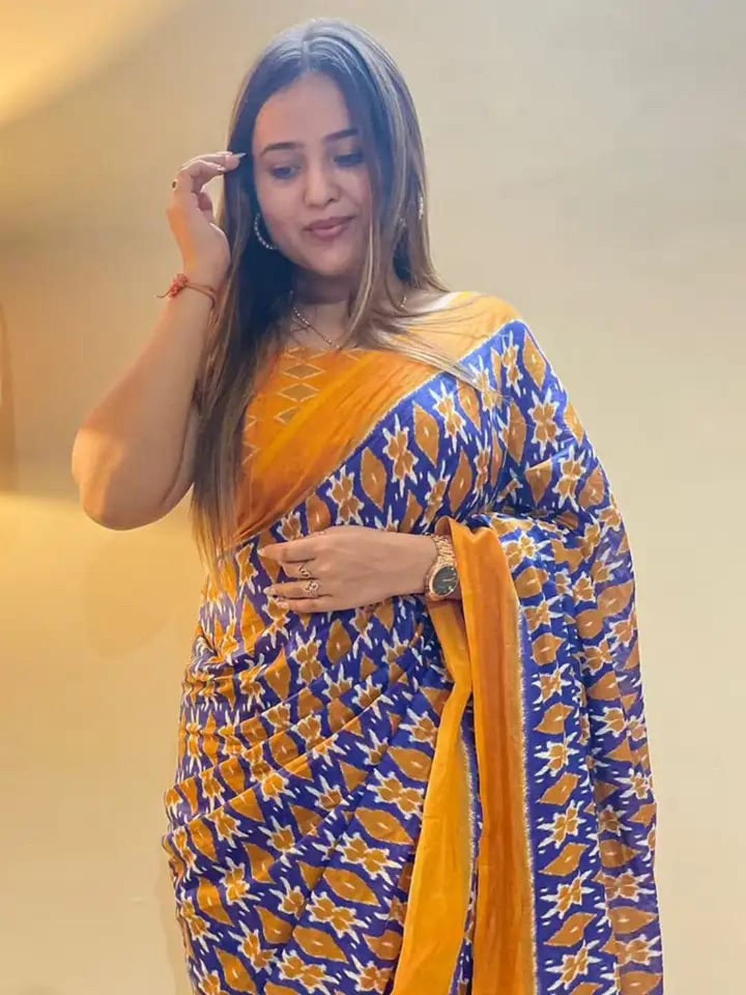Pochampally Ikat Handloom Saree in Vibrant Orange and Blue.