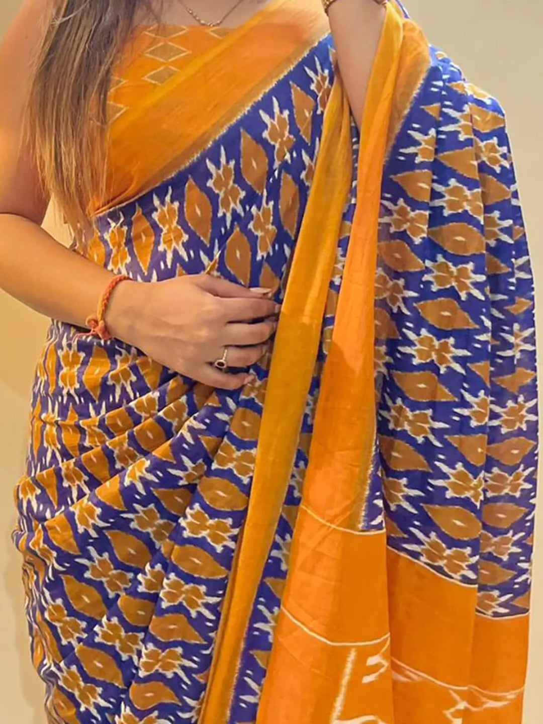Pochampally Ikat Handloom Saree in Vibrant Orange and Blue.