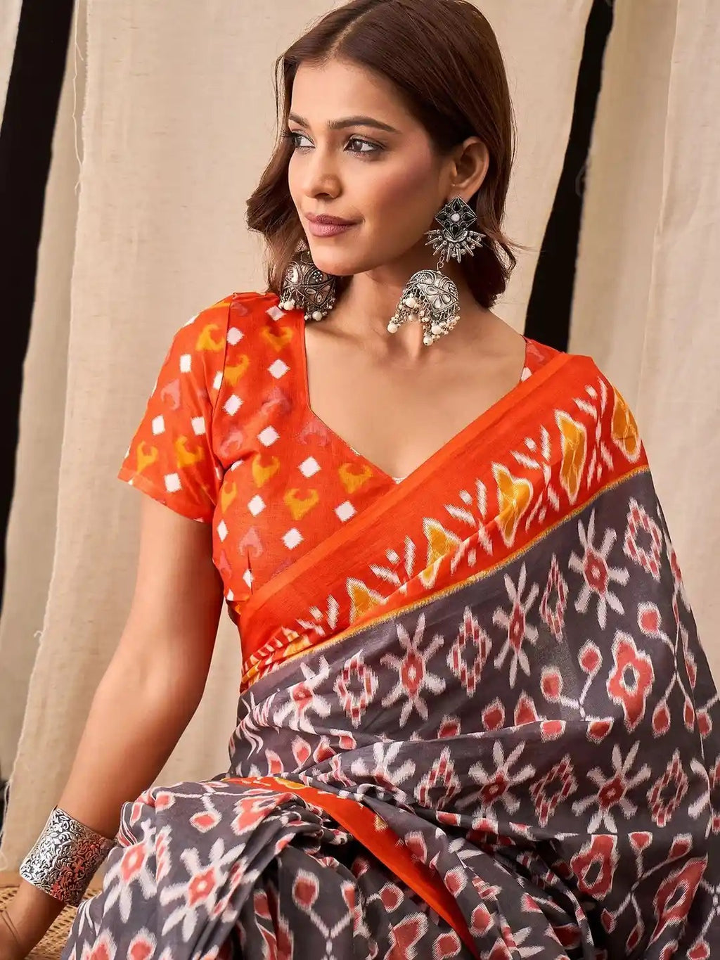 Pochampally Ikat Handloom Saree in Vibrant Orange and Blue.