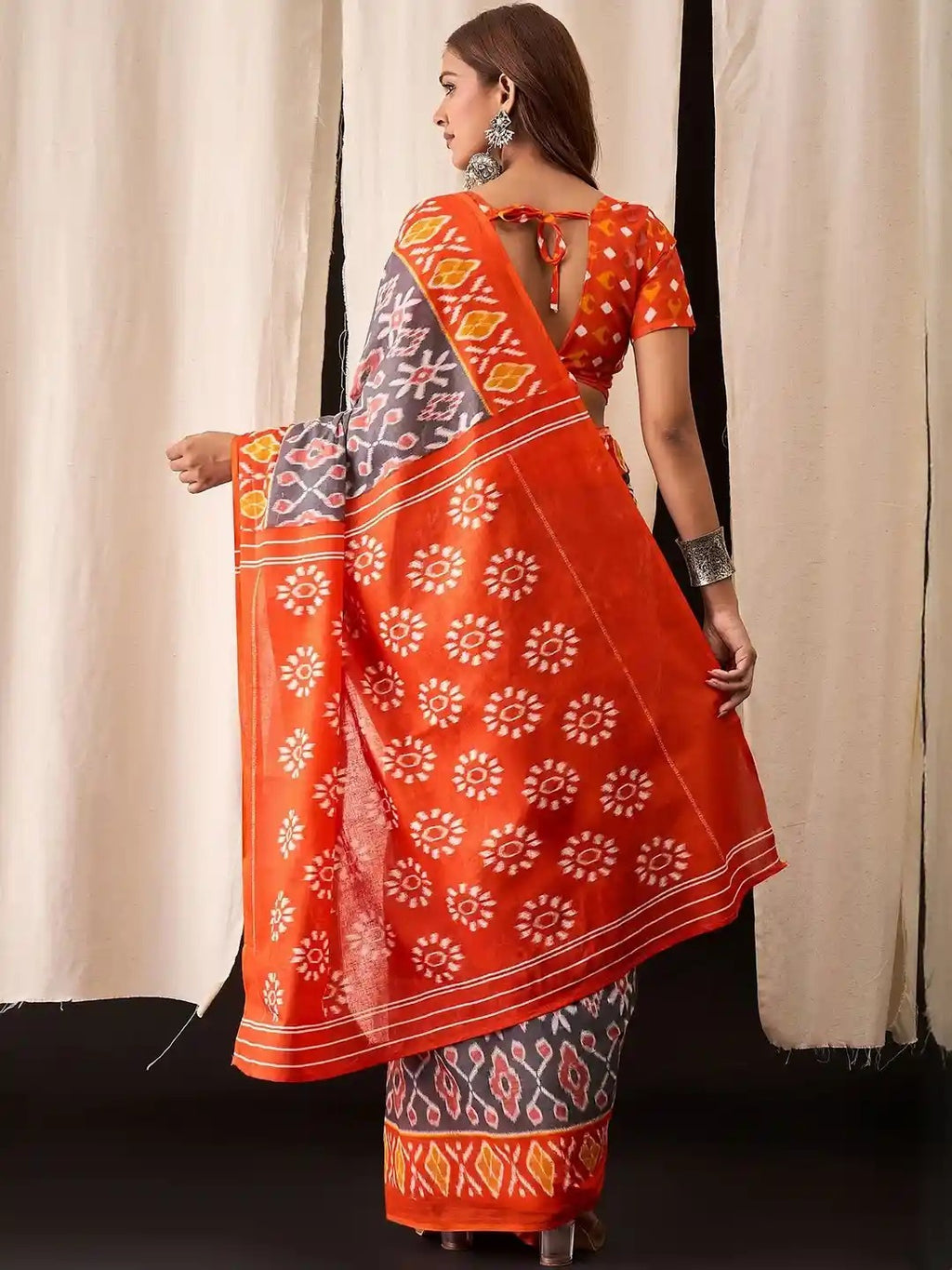 Pochampally Ikat Handloom Saree in Vibrant Orange and Blue.