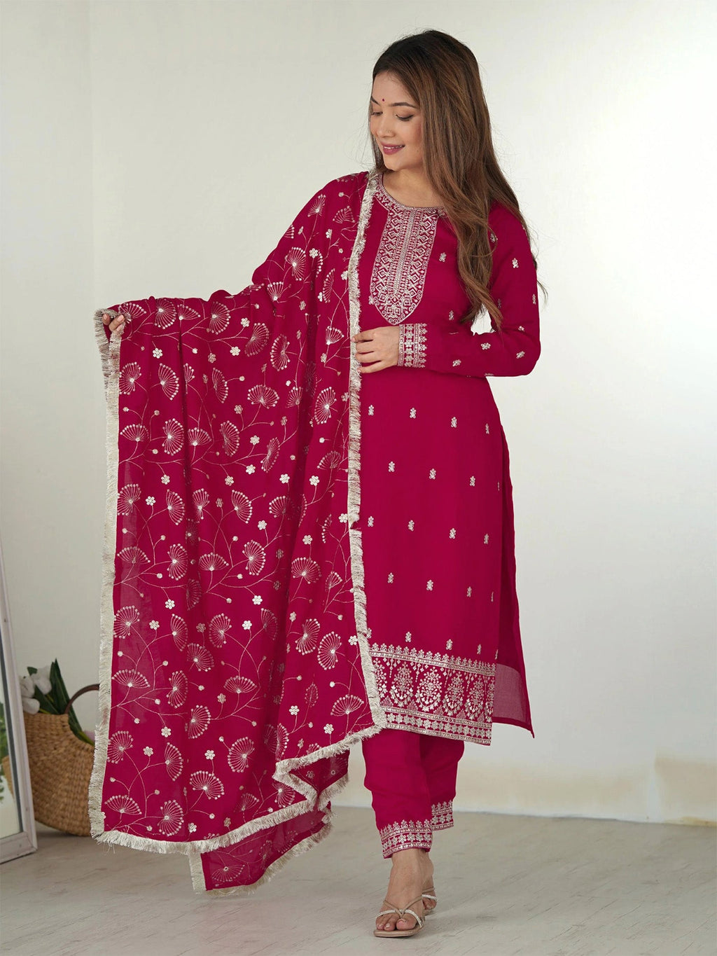 Rani pink georgette embroidered kurta set with pants and a matching dupatta