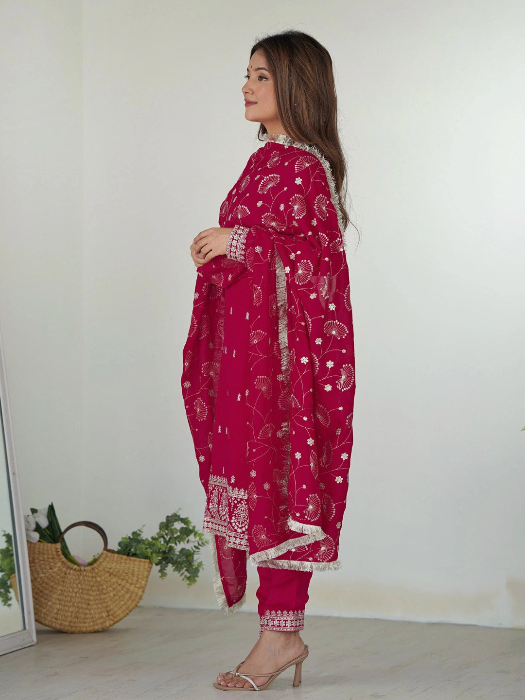Rani pink georgette embroidered kurta set with pants and a matching dupatta