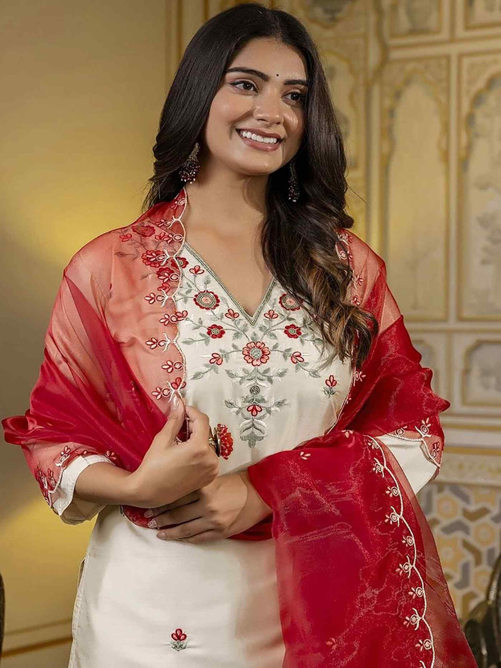 white silk blend embroidered kurta set with a matching red organza dupatta