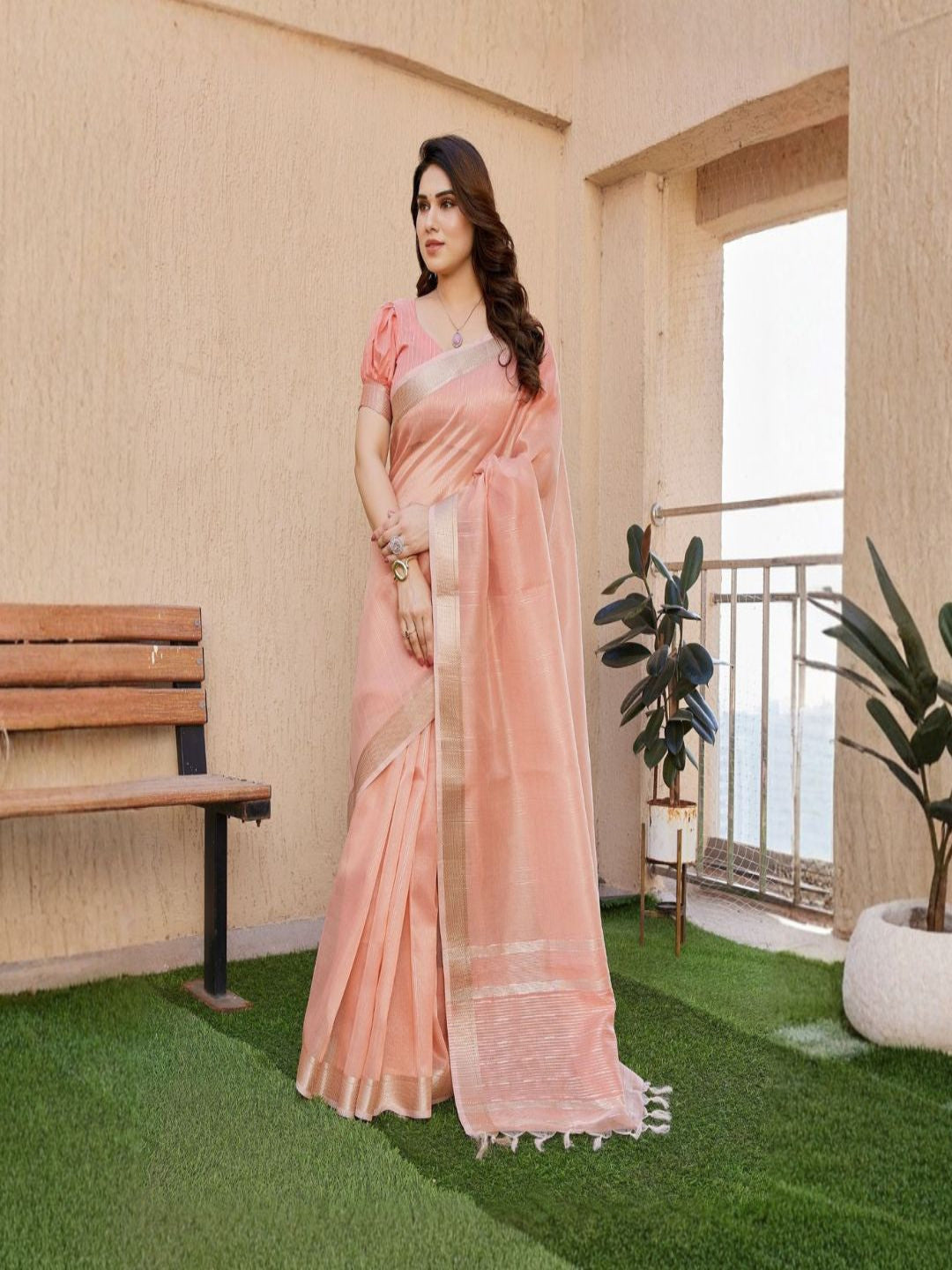 Pastel Aura Tissue Linen Silk Zari Saree