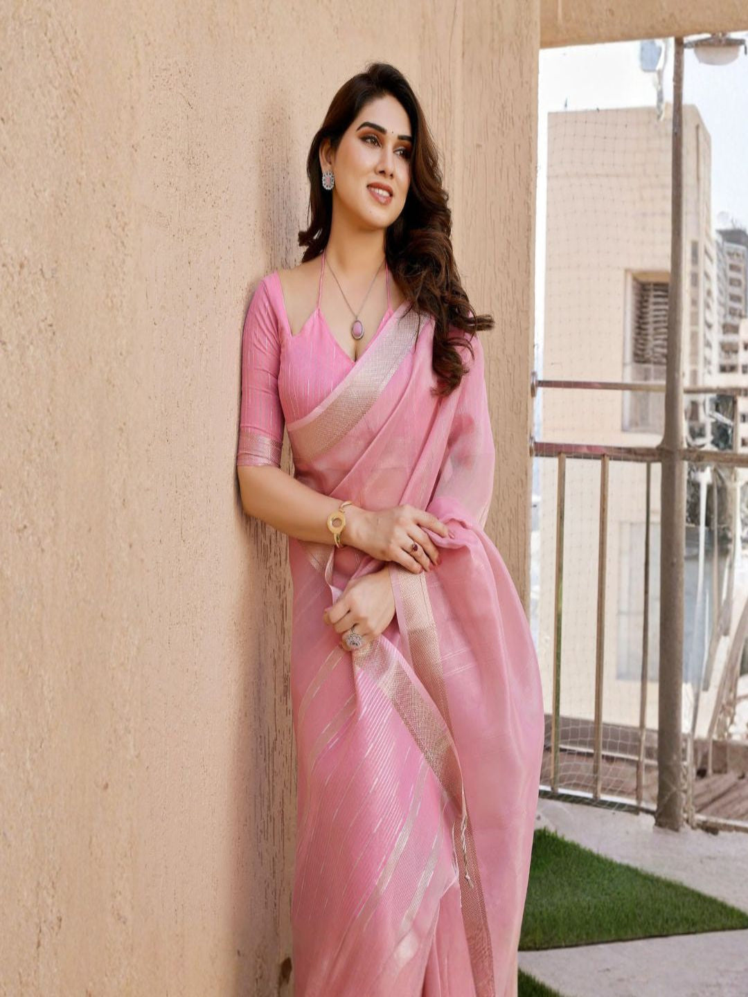 Pastel Aura Tissue Linen Silk Zari Saree