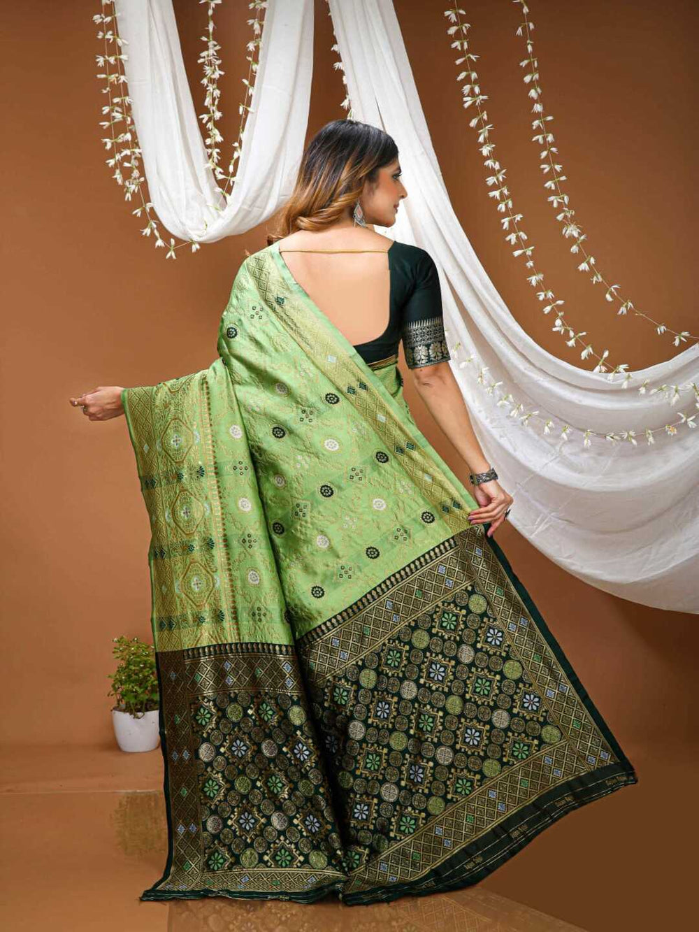 Elegant Bottle Green Banarasi Silk Saree with Contrast Red Zari Border