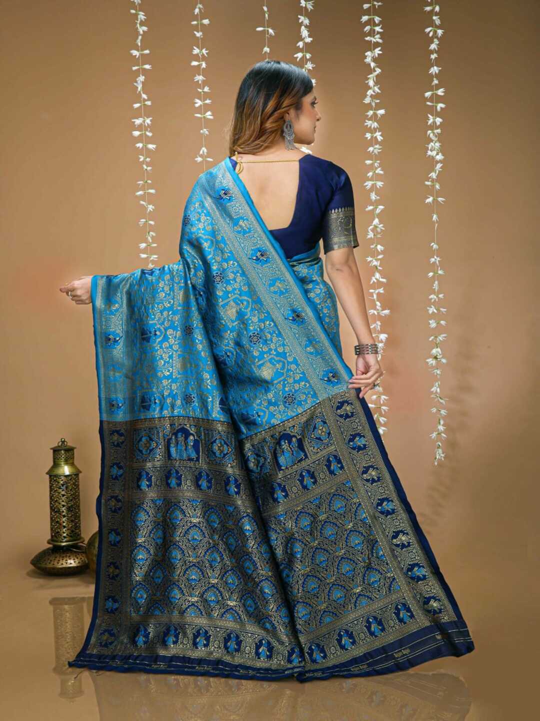 Graceful Pastel Green Banarasi Silk Saree with Rich Zari Border