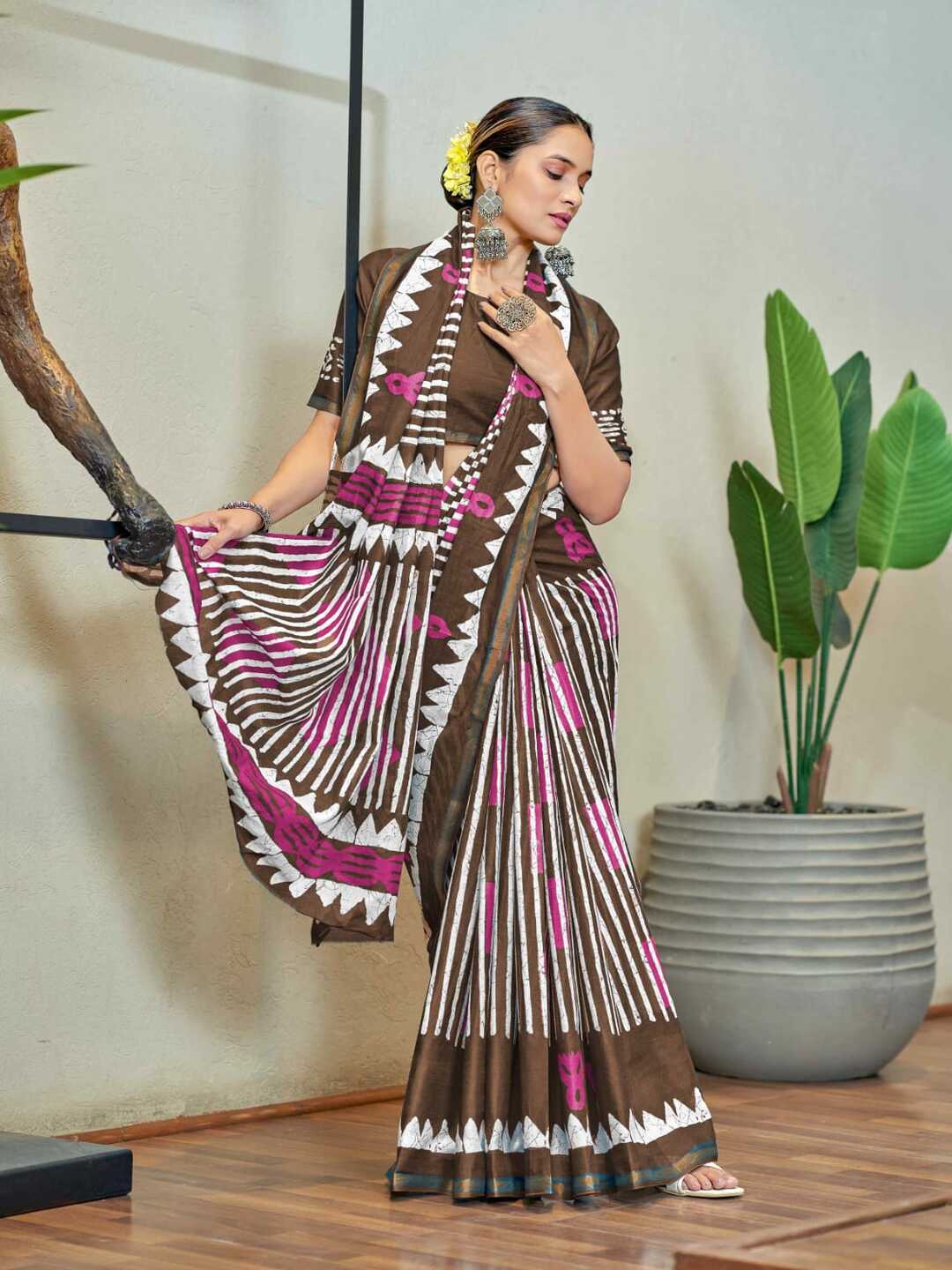 Trendy Brown Printed Saree with Bold Geometric Design