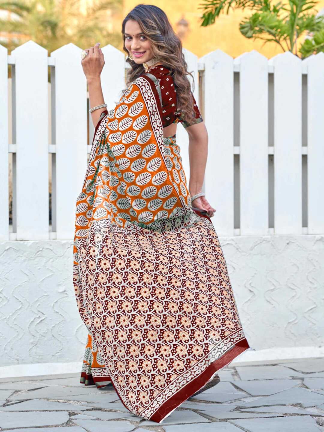 Stylish Orange & Maroon Printed Saree with Contrast Border