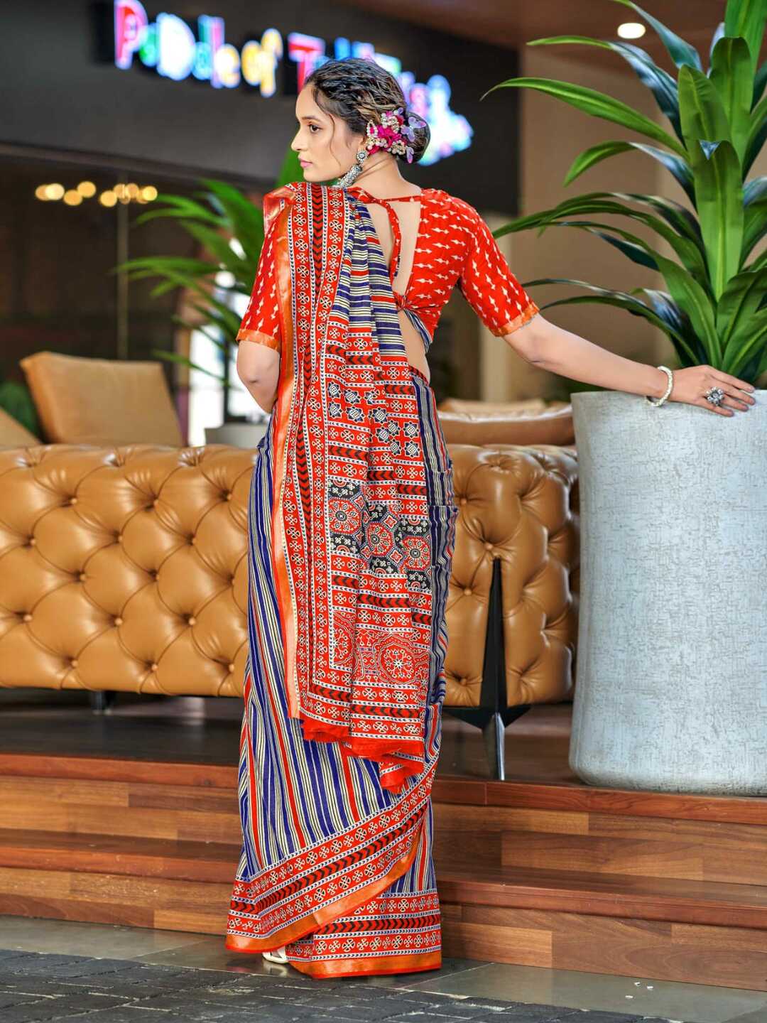 Vibrant Orange Printed Pure Cotton Saree with Traditional Patterns