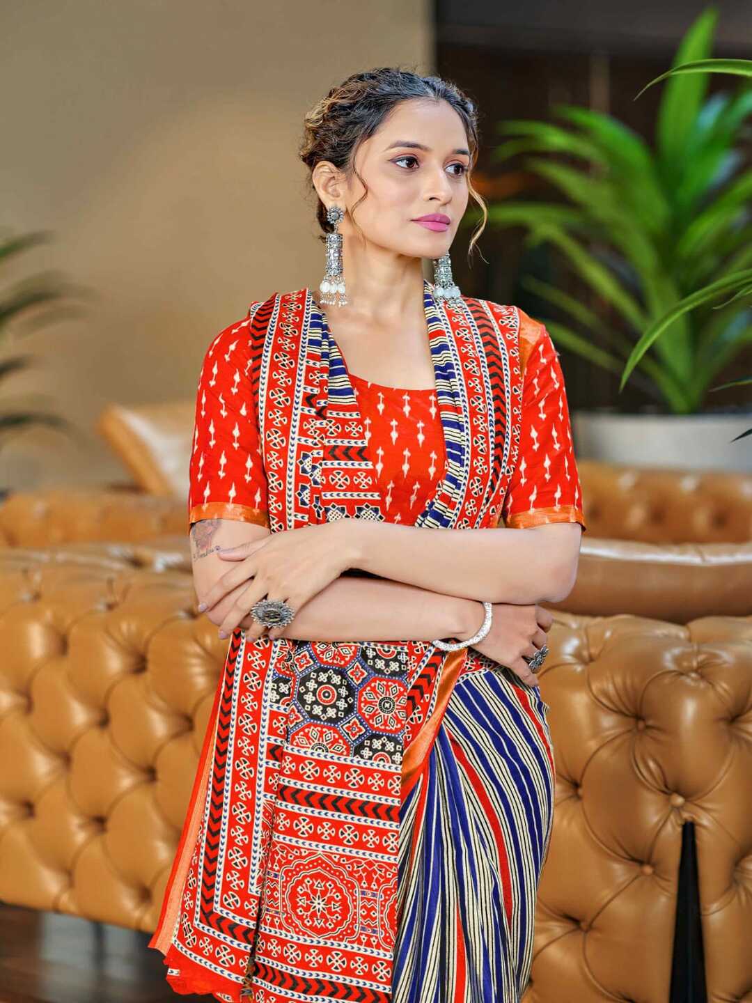 Vibrant Orange Printed Pure Cotton Saree with Traditional Patterns