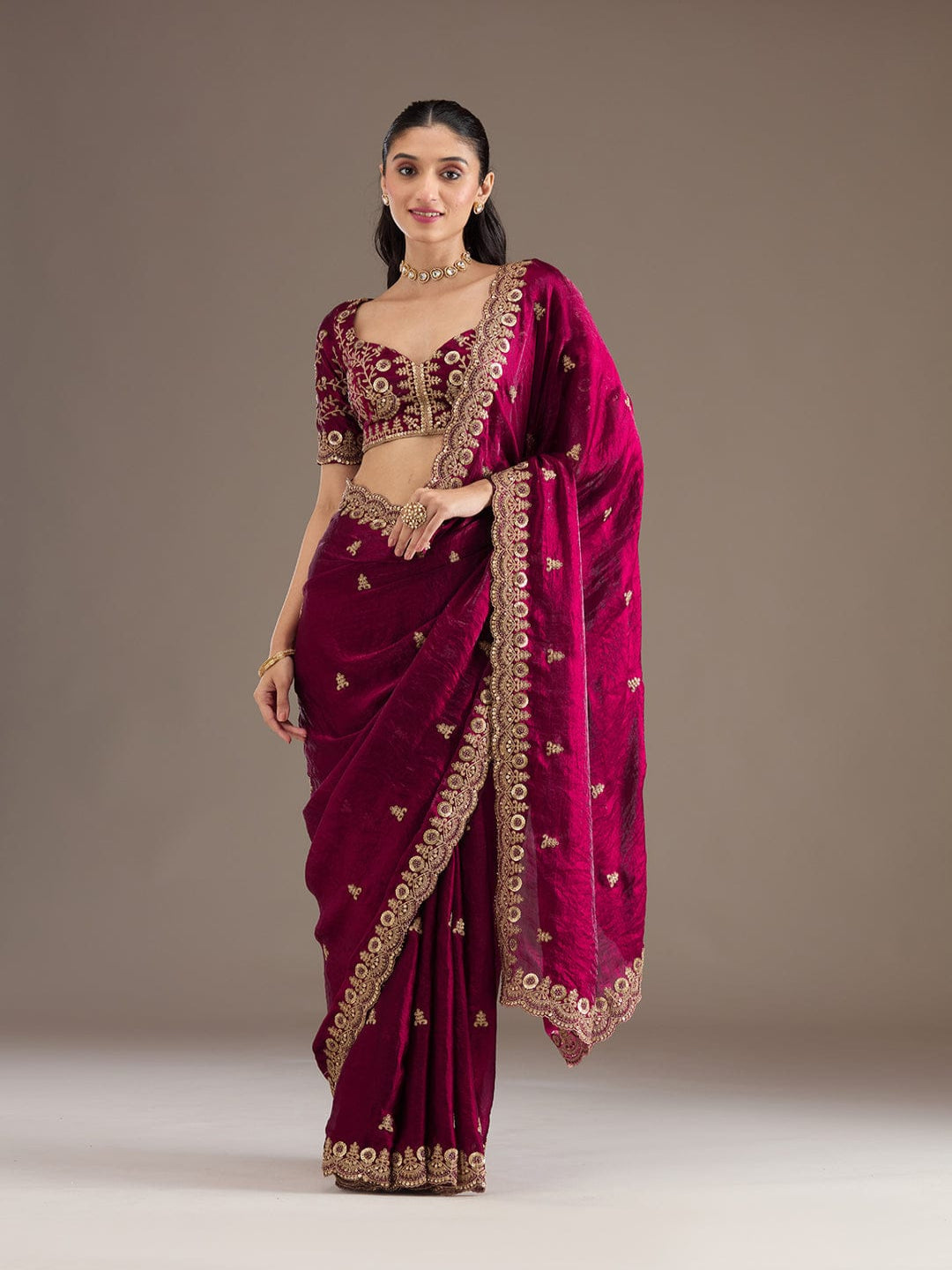 Elegant Emerald Green Embroidered Saree with Heavy Golden Designer Border – Wedding & Festive Wear