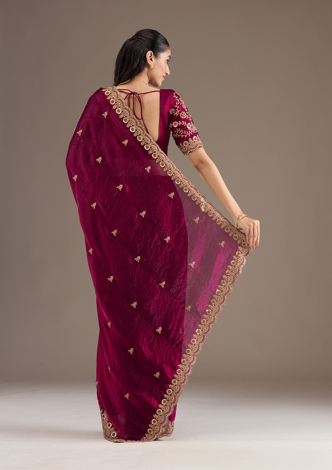 Elegant Emerald Green Embroidered Saree with Heavy Golden Designer Border – Wedding & Festive Wear