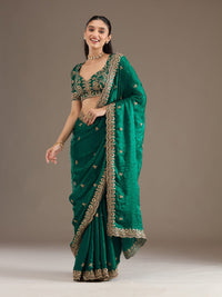 Elegant Emerald Green Embroidered Saree with Heavy Golden Designer Border – Wedding & Festive Wear